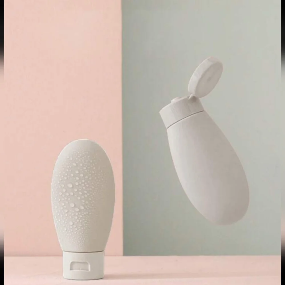 Refillable lotion bottle